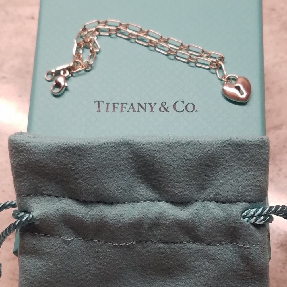 Tiffany & Co. square link bracelet with mini heart keyhole charm